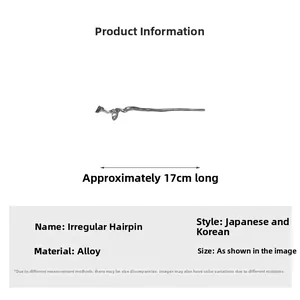 Détail d'un pic à cheveux irrégulier en argent de 17 cm de long en alliage