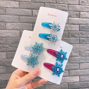 Sparkly snowflake hair clips set for children in blue, silver and pink with glitter finish