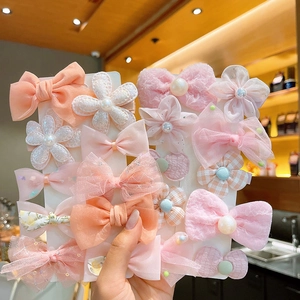 Détails d'un lot de barrettes à fleurs et nœuds en dentelle rose et blanc pour filles