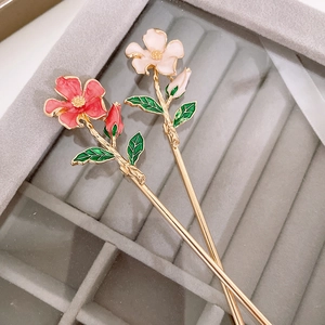 Elegant Chinese lily of the valley hairpins with gold metal finish and enamel flowers