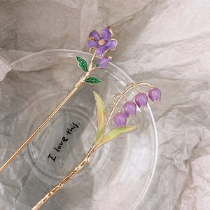 Elegant lily of the valley hair pin with purple floral enamel and gold metal base