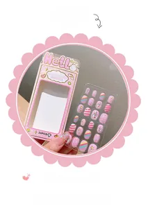 Detailed macro view of 24pcs pink unicorn and rainbow press-on nails for kids