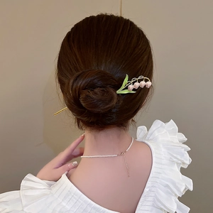 Elegant lily of the valley hair pin with pink flowers and green enamel leaves for bun styles