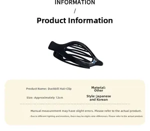 Détail d'une grande pince à cheveux noire de 12 cm montrant les dimensions et la finition lisse