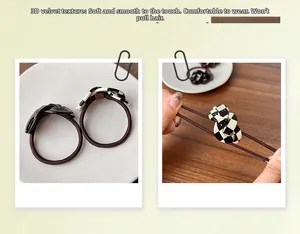 Detail showing high-elasticity hair tie set with black checkerboard chain link ornament