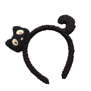 Fascia per capelli a gatto in peluche nero con grandi occhi e coda riccia per il trucco