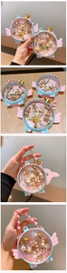 Detail of cartoon jewelry gift box set with angel wings, golden crown and pearl handle