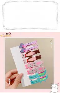 Set of eight colorful cartoon animal hair clips including bears and dogs on a card