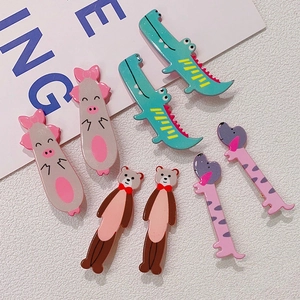 Kawaii 3D animal hair clips featuring crocodile, pig, and bear designs on a white surface