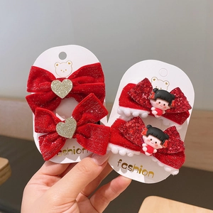 Fiocchi rossi per capelli in velluto e glitter per bambine con bambole e cuori dorati