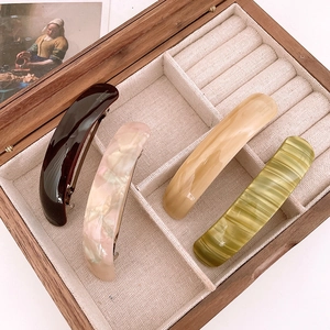 Elegant French acetate hair clip set in earth tones with handmade spring metal fasteners