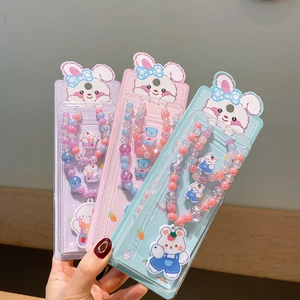 Detailed set of colorful beaded necklaces and rings with cute cartoon rabbit cards