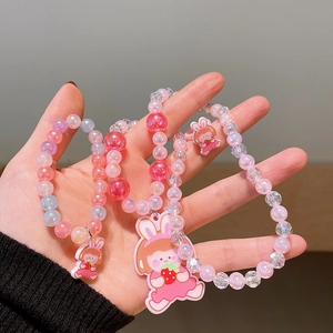 Handheld colorful beaded children jewelry set featuring cute cartoon girl pendants and beads
