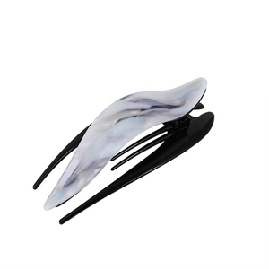 Elegant wave design hair clip with gray marble texture on black acetate base