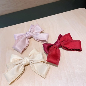Handmade satin bow hair clips in pink, beige and burgundy with pleated edges