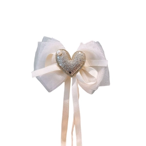 Fiocco per capelli in pizzo per bambine con rete crema e paillettes dorate