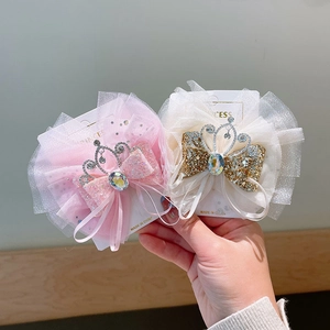 Fermagli per capelli principessa con fiocco in rete e corona glitterata per bambine
