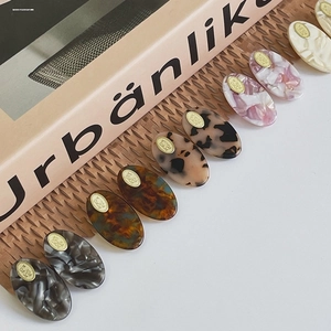 9pcs set of minimalist oval acetate hair clips in marble and tortoiseshell patterns