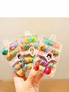 Close-up of colorful high-elastic hair ties and small plastic clips in macaron colors