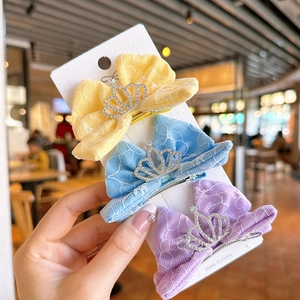 Tres pinzas para el cabello con coronas de strass para niñas en azul, amarillo y lila