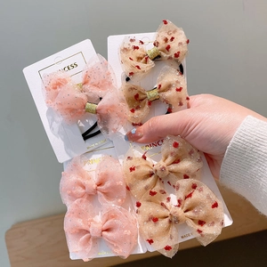 Fermagli per capelli con fiocchi in rete rosa e champagne, paillettes e petali di fiori