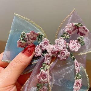 French romantic style children's hair clip with blue organza bow and rose embroidery
