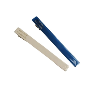 Elegant beige and navy blue acetate barrette hair clips with gold handmade branding