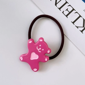 Detail of cute pink bear hair tie for girls featuring a durable elastic rubber band accessory