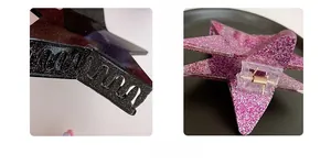 Macro detail of large star-shaped hair claw clips with glitter finish and clear spring