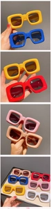Close-up of stylish thick square frame children's sunglasses in vibrant candy colors
