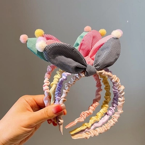 Handmade pleated fabric headbands with plaid bunny ears and colorful pom-poms for girls