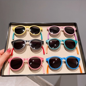 Set of six colorful round-frame folding sunglasses for kids with UV protection lenses