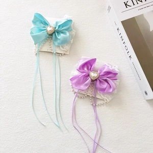 Lace bow hair clip with tassels and pearls for girls in light blue and purple