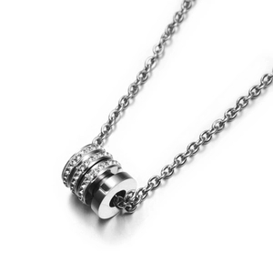 Hip hop titanium steel necklace featuring a polished cylindrical pendant with inlaid crystals
