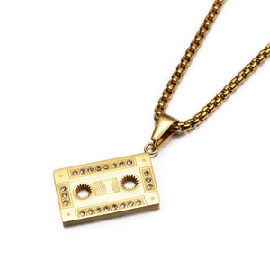 Hip hop style gold cassette tape pendant necklace with cubic zirconia on box chain