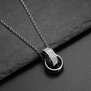 Hip hop style double interlocking ring necklace with crystal paved stainless steel pendant