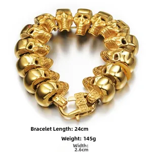 Detail shot of golden skull link bracelet showing 24cm length and 2.6cm width