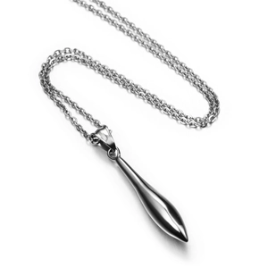 Close-up of polished silver torpedo pendant necklace with minimalist titanium steel chain
