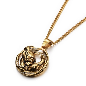 Detailed close-up of golden hip hop tiger pendant with small crystals on a chain