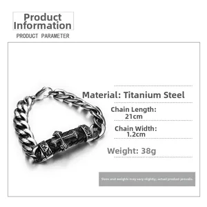 Macro shot of hip hop cross bracelet with titanium steel chain and black leather detail