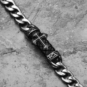 Detailed macro view of vintage hip hop Cuban chain bracelet with retro metal cross