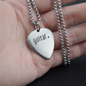 Minimalist guitar pick pendant necklace in stainless steel with star engraving on black leather