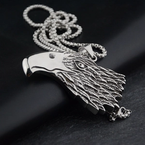 Retro eagle head pendant necklace in stainless steel with detailed feather texture