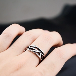 Edgy silver thorn branch hollow ring in oxidized titanium steel for a hip hop gothic style