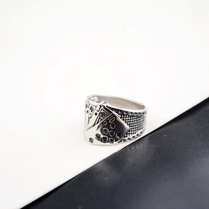 Vintage stainless steel royal flush poker ring with detailed spade engraving and wide band