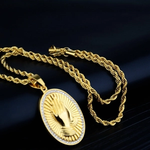 Golden titanium steel twist chain necklace with sparkling iced out praying hands pendant