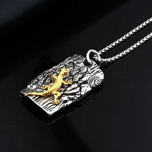 Industrial vintage titanium steel necklace with lizard relief on a textured silver pendant