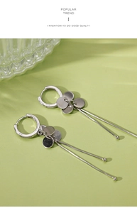 Detailed macro view of S925 sterling silver earring hoop with engraved hallmark