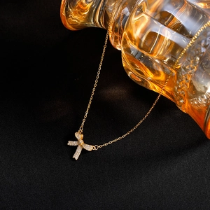 Exquisite 925 sterling silver bow pendant necklace with sparkling pavé zircons in gold finish