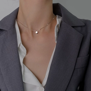 Minimalist 925 sterling silver lucky necklace featuring a polished tube and engraved pendant